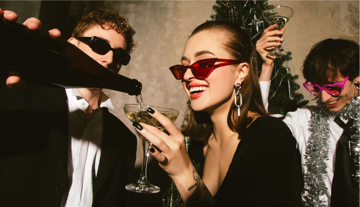 Women being poured champagne