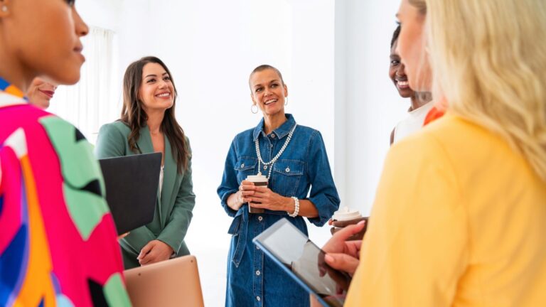 women-event-planners-standing-in-a-circle-for-a-meeting