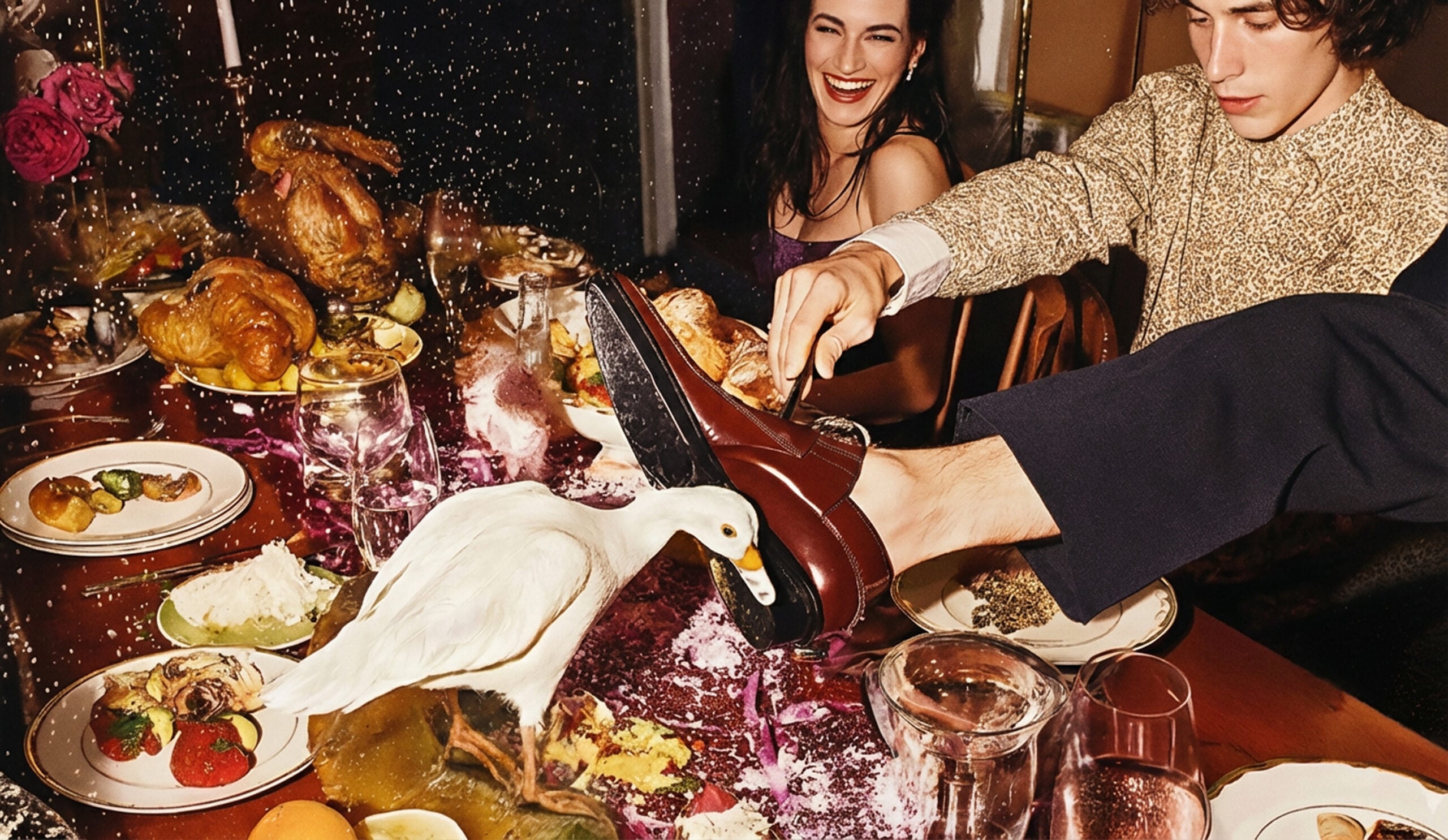 people enjoying duck on a dinner table